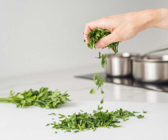 Hand dropping parsley